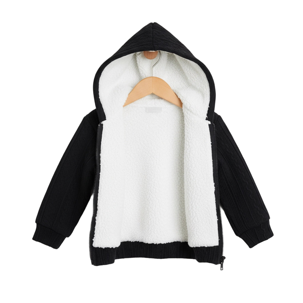 Black and white hoodie on a hanger against a light gray background