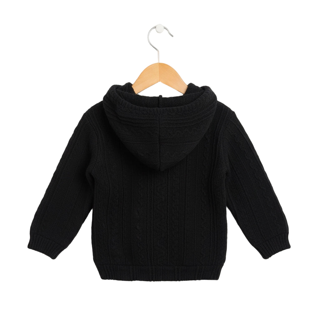 Black hoodie on a wooden hanger against a white background