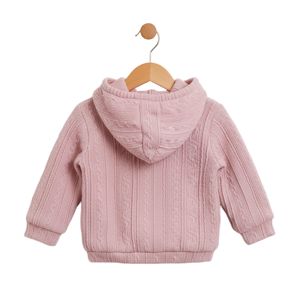 Pink children's hoodie on a wooden hanger against a white background