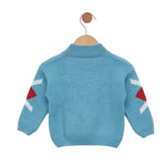 Blue children's sweater with red and white patterns on a hanger against a light gray background