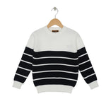 Black and white striped sweater on a hanger against a white background