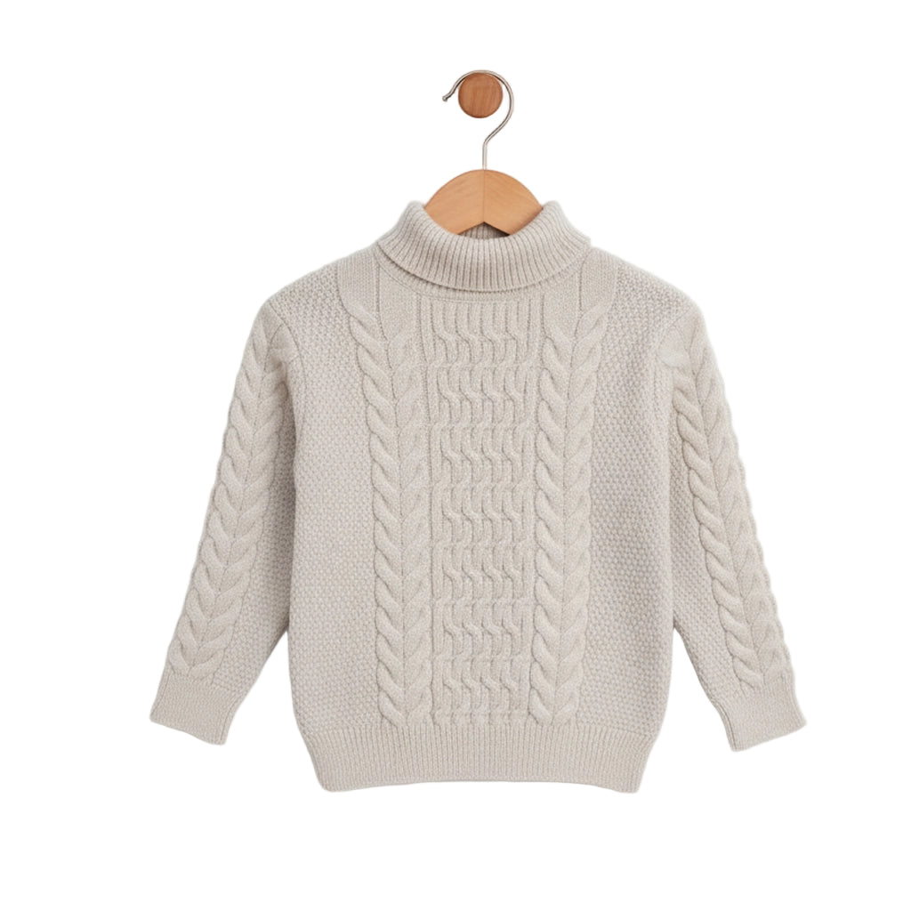 Beige cable knit sweater on a wooden hanger against a white background