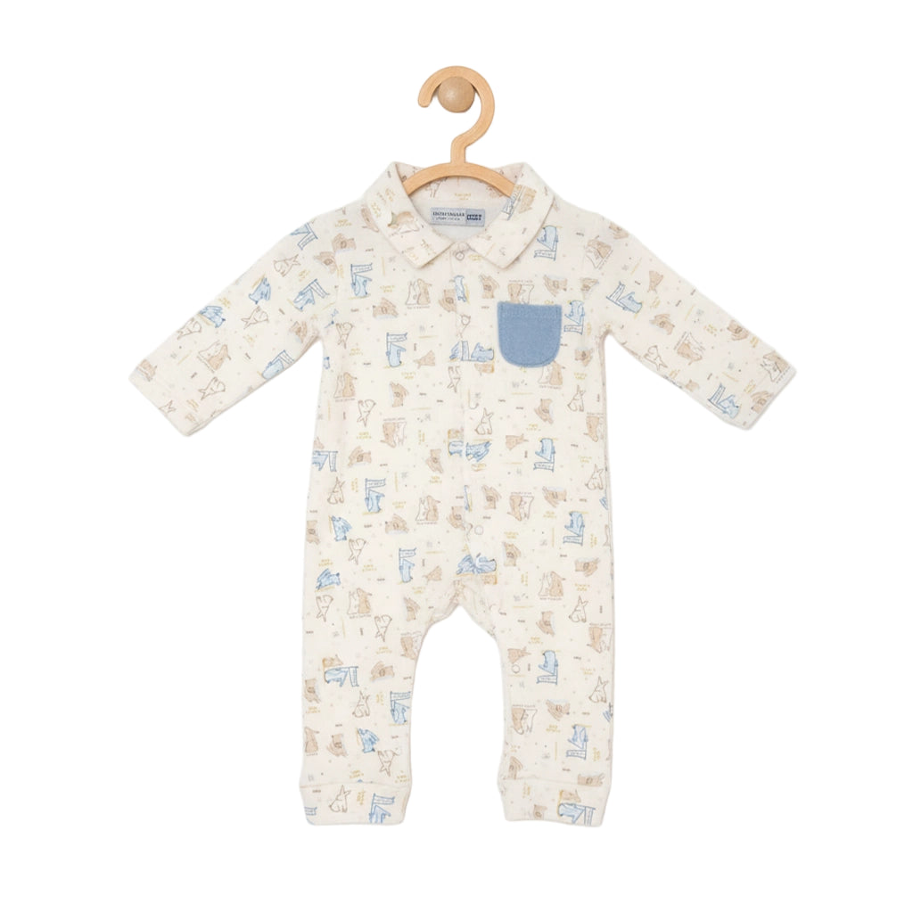 Baby onesie with blue pocket and pattern on a hanger against a white background