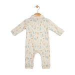 Baby onesie with animal pattern on a hanger against a white background
