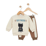 Children's Batman-themed outfit with sweatshirt and pants on hangers against a white background
