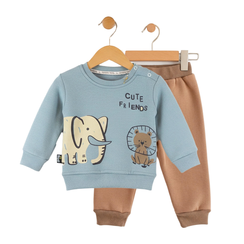 Children's outfit with blue sweatshirt and brown pants on a hanger against a white background