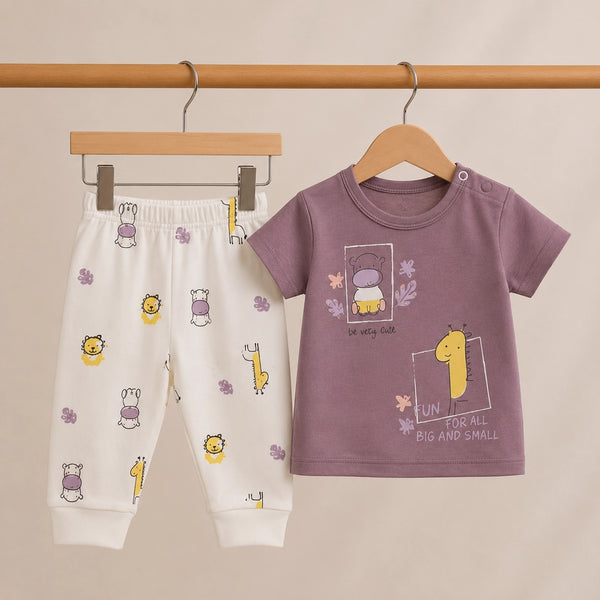 Children's t-shirt and pants with animal prints on a beige background