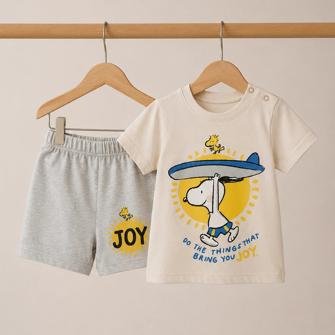 Children's t-shirt and shorts set with cartoon design on a beige background