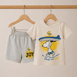 Children's t-shirt and shorts set with cartoon design on a beige background