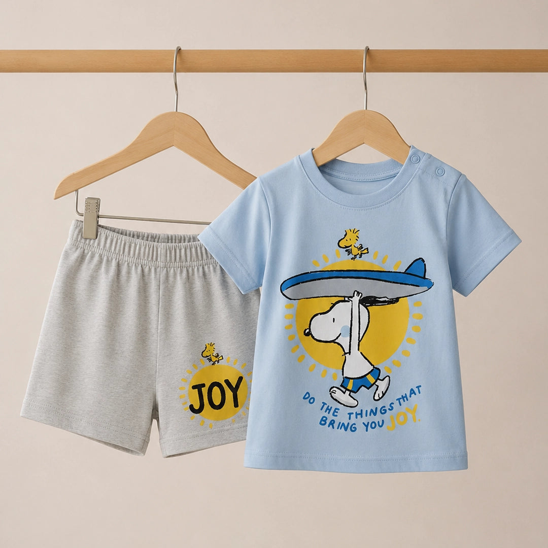 Children's t-shirt and shorts set with cartoon design on a beige background