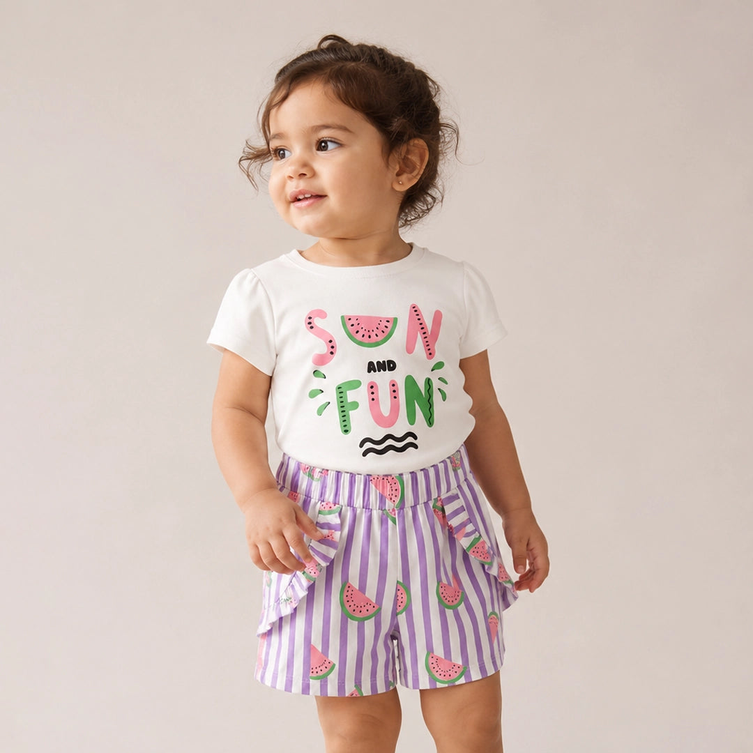 Child wearing a white t-shirt with 'Summertime Fun' text and purple striped shorts with watermelon designs on a plain background.