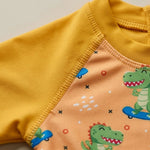 Skater Dino One-Piece Sunsuit | UPF 50+ Protection | Ages 3M–18M