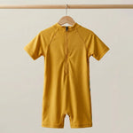 Skater Dino One-Piece Sunsuit | UPF 50+ Protection | Ages 3M–18M