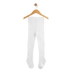 White tights hanging on a wooden hanger against a white background