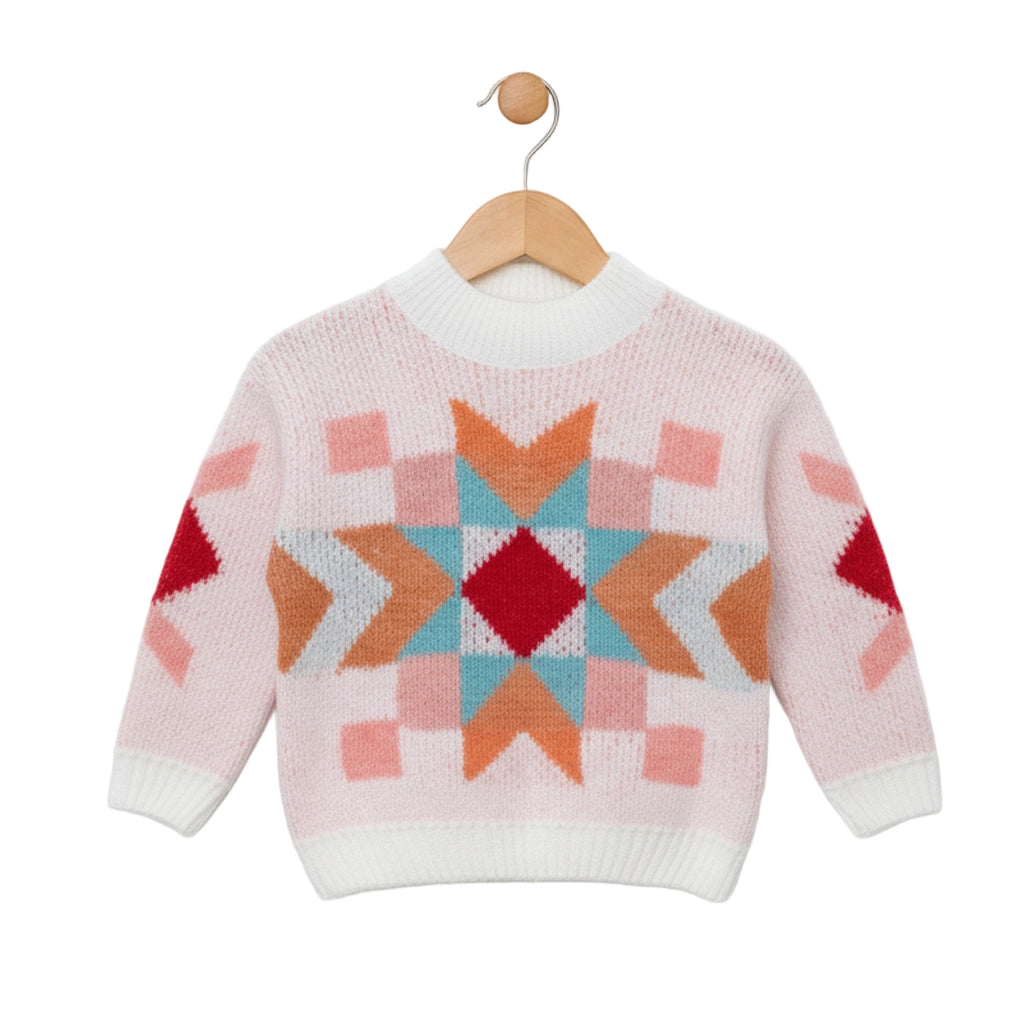 Children's sweater with geometric pattern on a wooden hanger against a white background