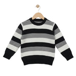 Striped sweater with black, gray, and white colors on a hanger against a light background