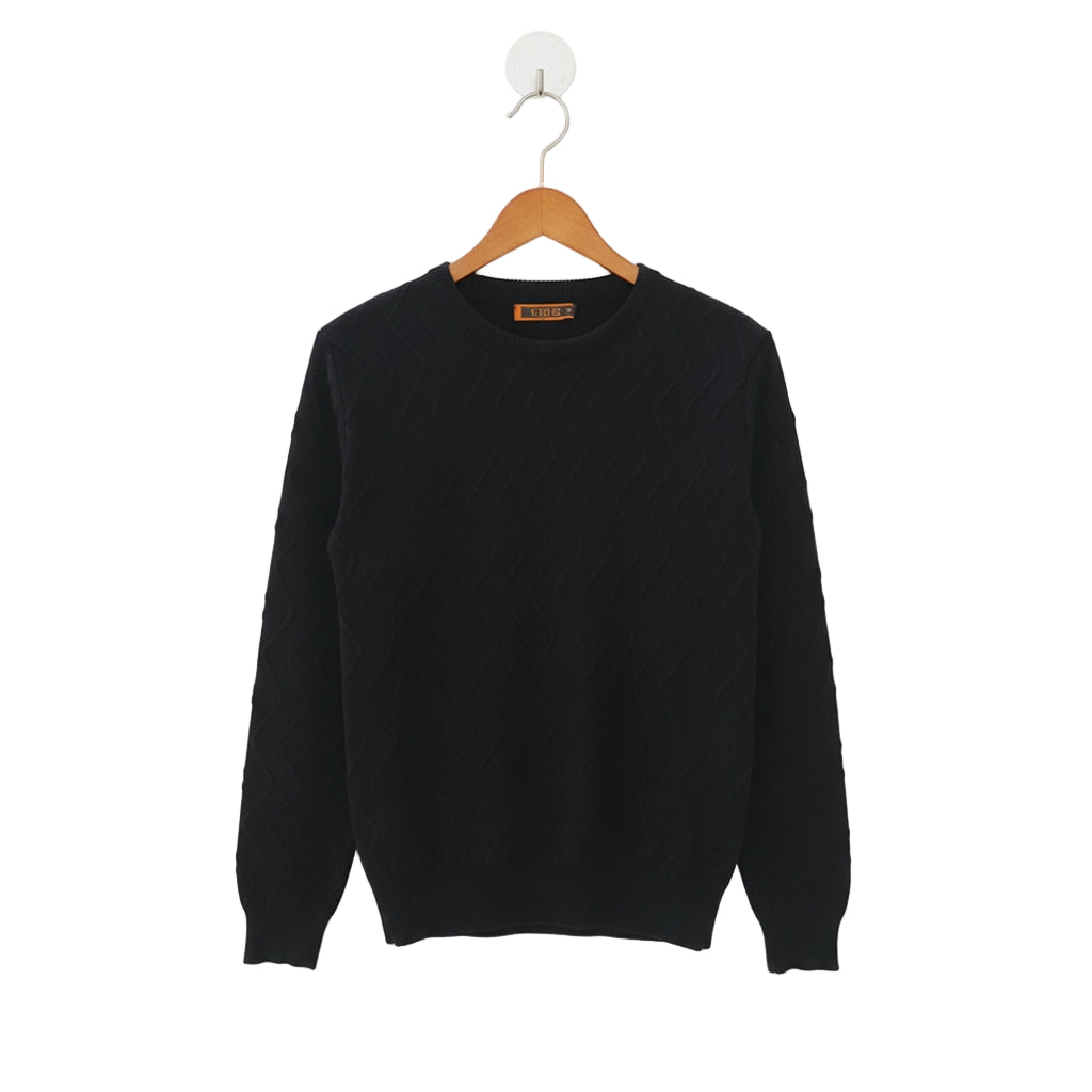 Navy blue sweater on a wooden hanger against a white background