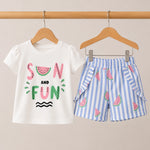 Children's t-shirt and shorts set with watermelon design on a beige background