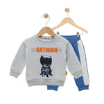 Children's sweatshirt with Batman design on a hanger against a white background