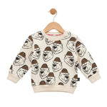 Children's sweater with bear pattern on a hanger against a white background