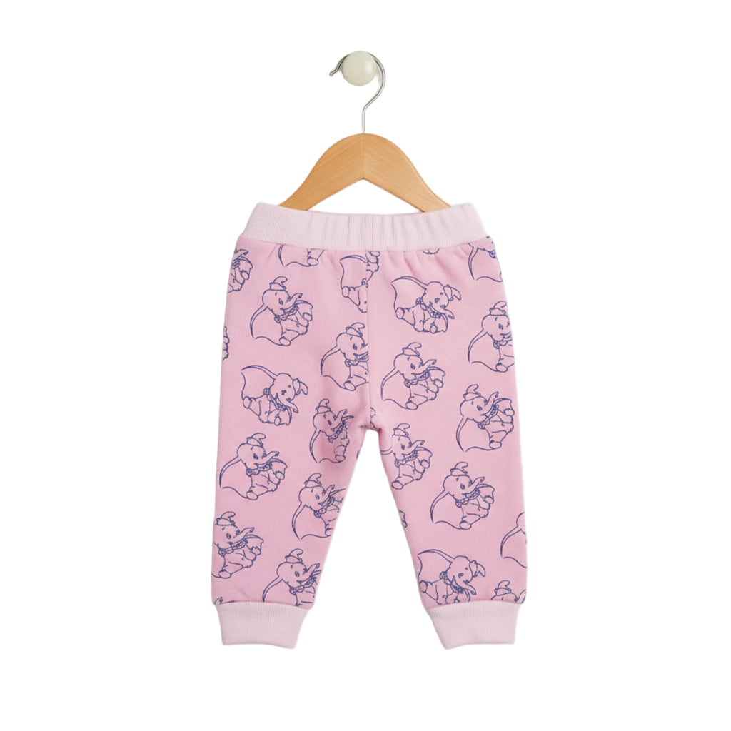 Pink baby pants with cartoon character pattern on a hanger against a white background