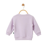 Lavender sweatshirt on a wooden hanger against a white background
