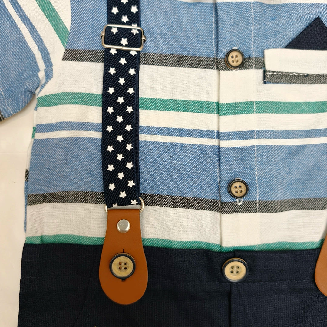 Close-up of a shirt with a strap and buttons, featuring a star pattern.