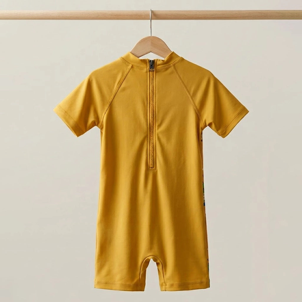 Skater Dino One-Piece Sunsuit | UPF 50+ Protection | Ages 3M–18M